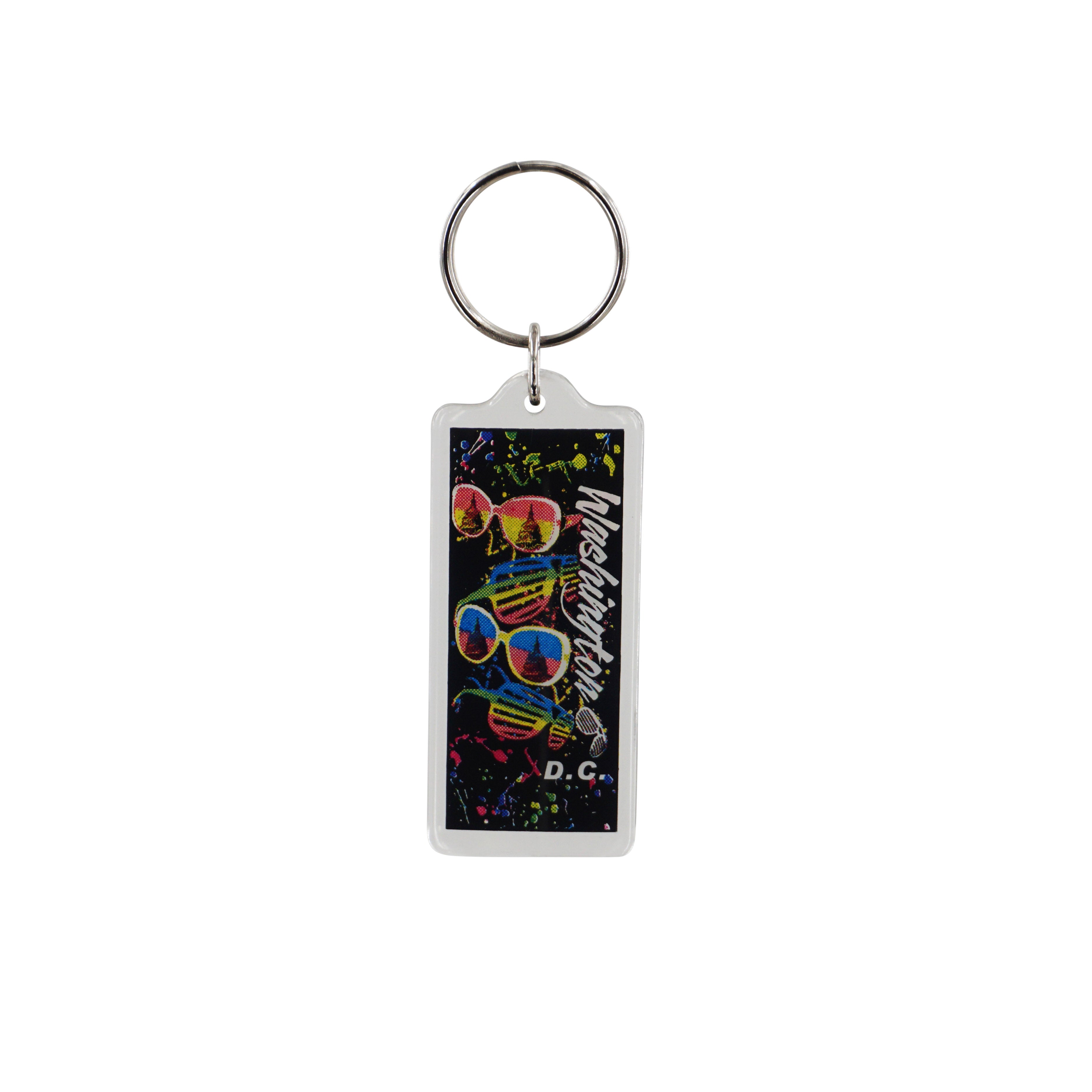 Colorful Washington DC acrylic keychain featuring skulls wearing sunglasses on a black background.