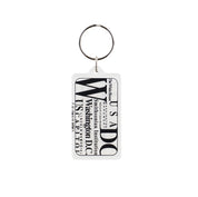 White rectangular Washington DC souvenir keychain with black typography featuring famous landmarks, museums, and national attractions.