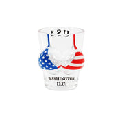 A clear glass shot glass with a bikini top design featuring the colors of the USA flag, with 'WASHINGTON D.C.