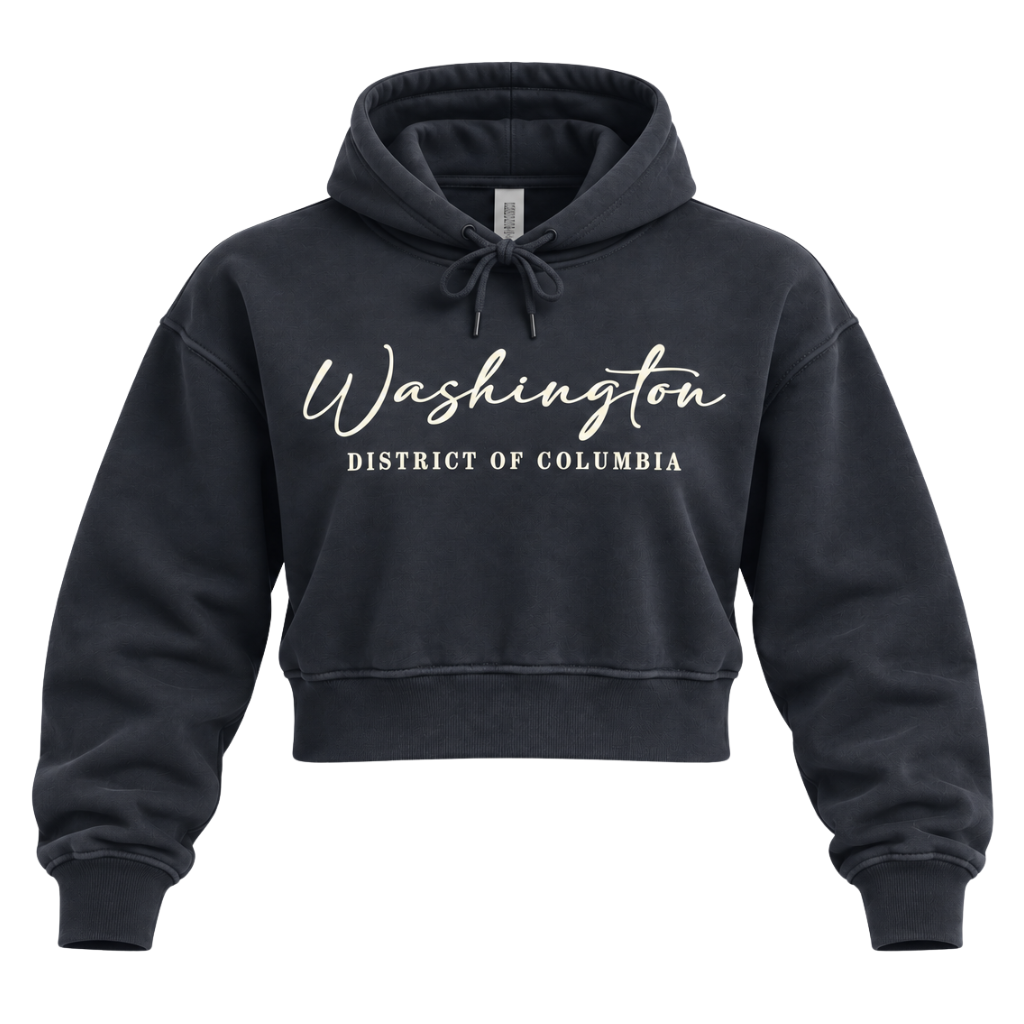 A dark charcoal gray cropped hoodie with 'Washington' and 'DISTRICT OF COLUMBIA' printed in white on the front, displayed on a clean white background.