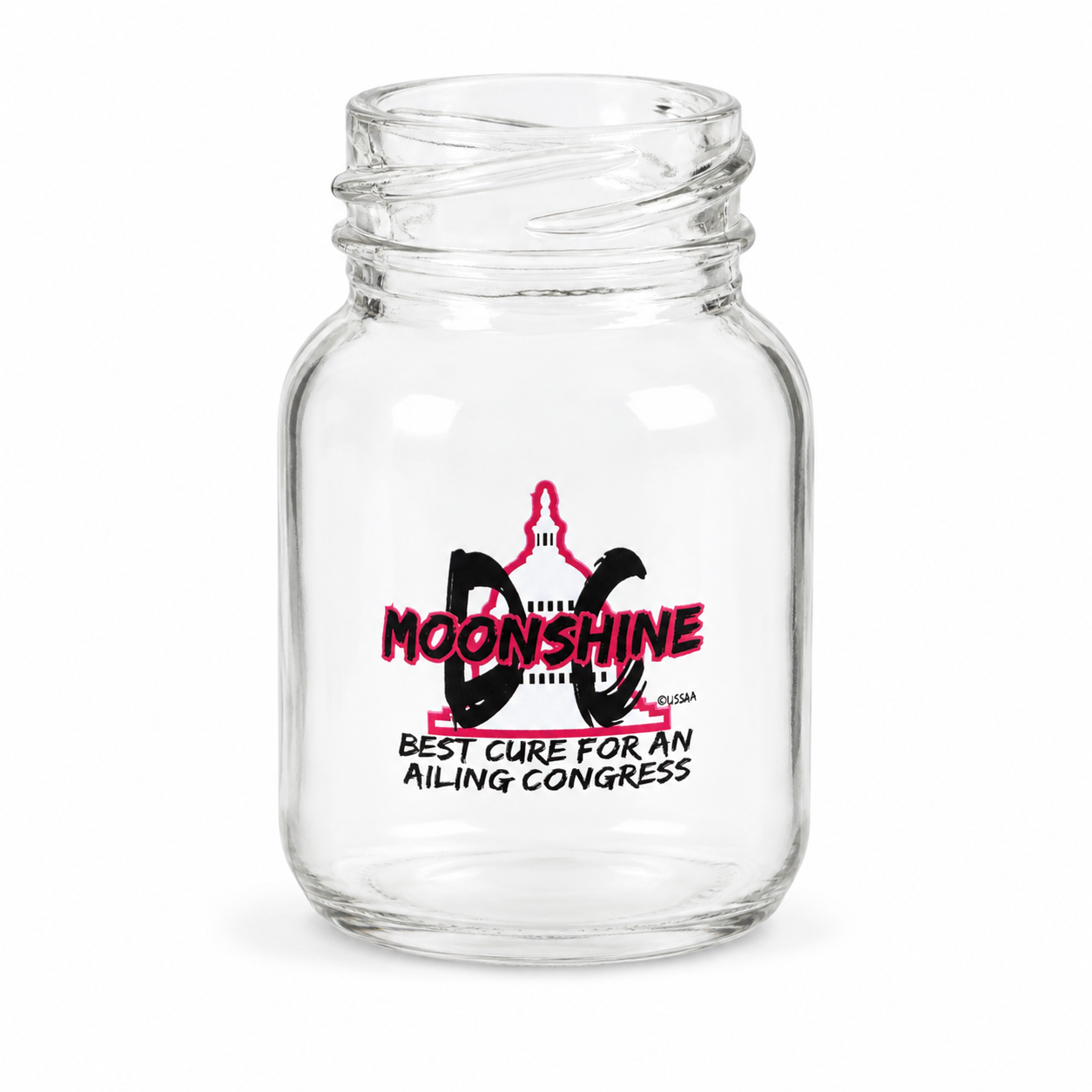 A clear glass jar with a threaded neck and a printed graphic on the front featuring a pink and black moon design with the text 'MOONSHINE' and 'BEST CURE FOR AN AILING CONGRESS' on a white background.