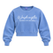 A light blue cropped crewneck sweatshirt with 'Washington District of Columbia' printed in white across the chest, displayed on a clean white background.
