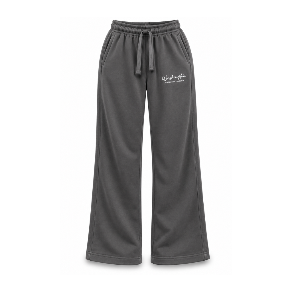 Dark gray wide-leg sweatpants with an elastic drawstring waist and a small white script logo on the left hip, shown against a plain white background.