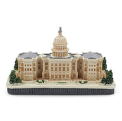 Model of a U.S. Capitol building with a dome on a white background