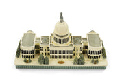 Model of a U.S. Capitol building with a dome on a white background
