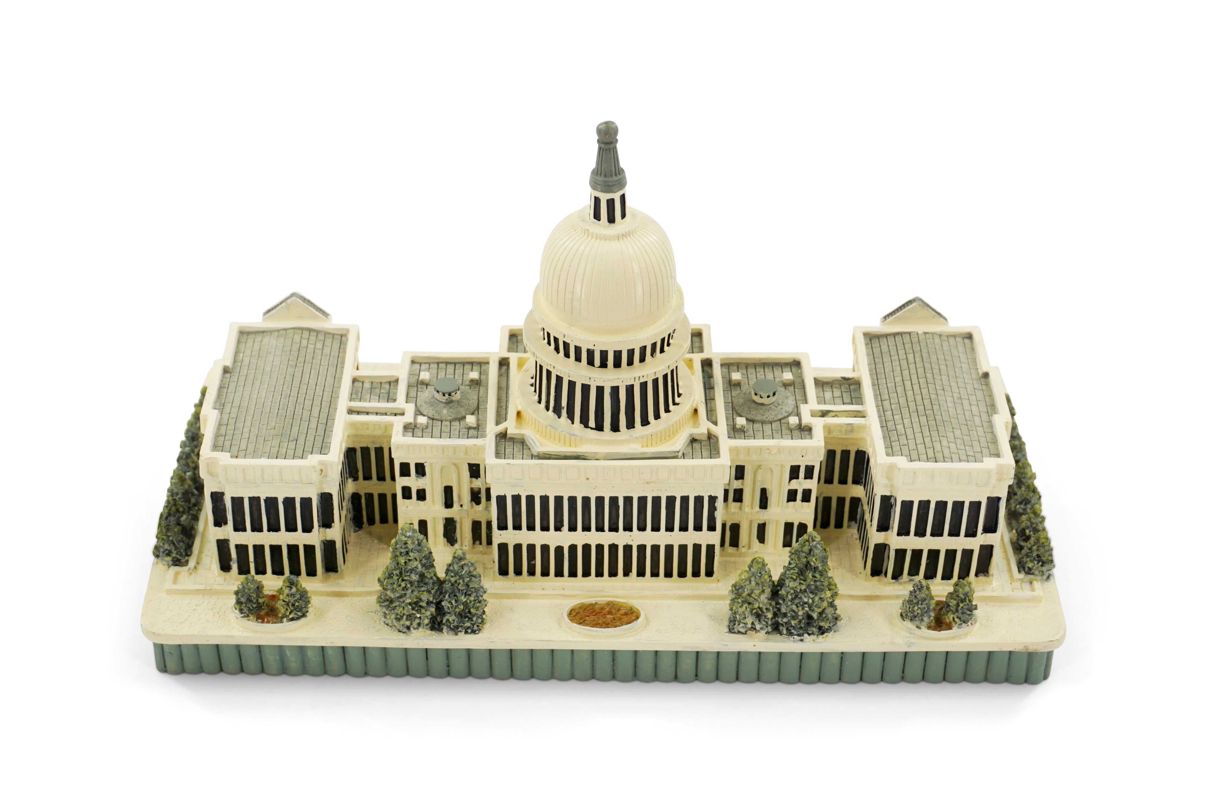 Model of a U.S. Capitol building with a dome on a white background