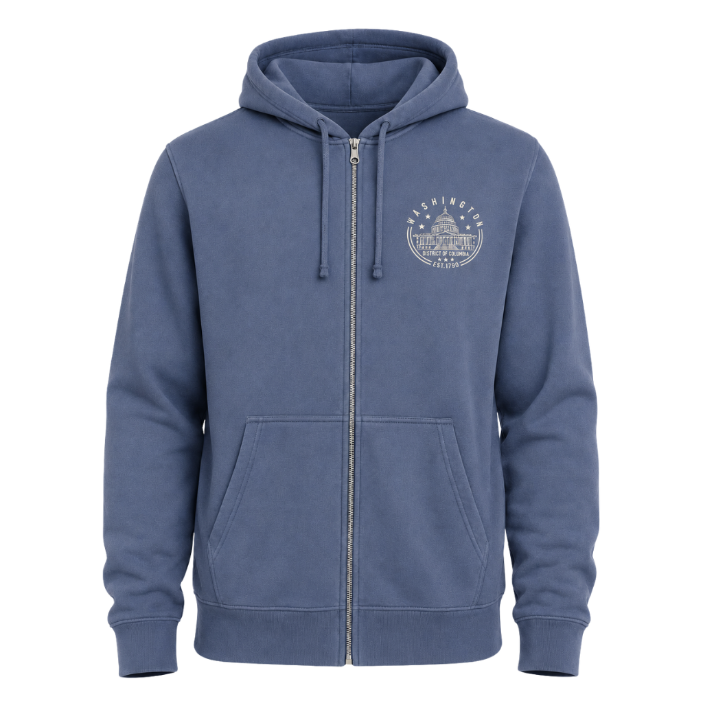 A slate blue zip-up hoodie with a drawstring hood, kangaroo pockets, and a circular chest graphic featuring a US Capitol building and the words 'Washington DC and 'EST. 1790', shown on a plain white background.