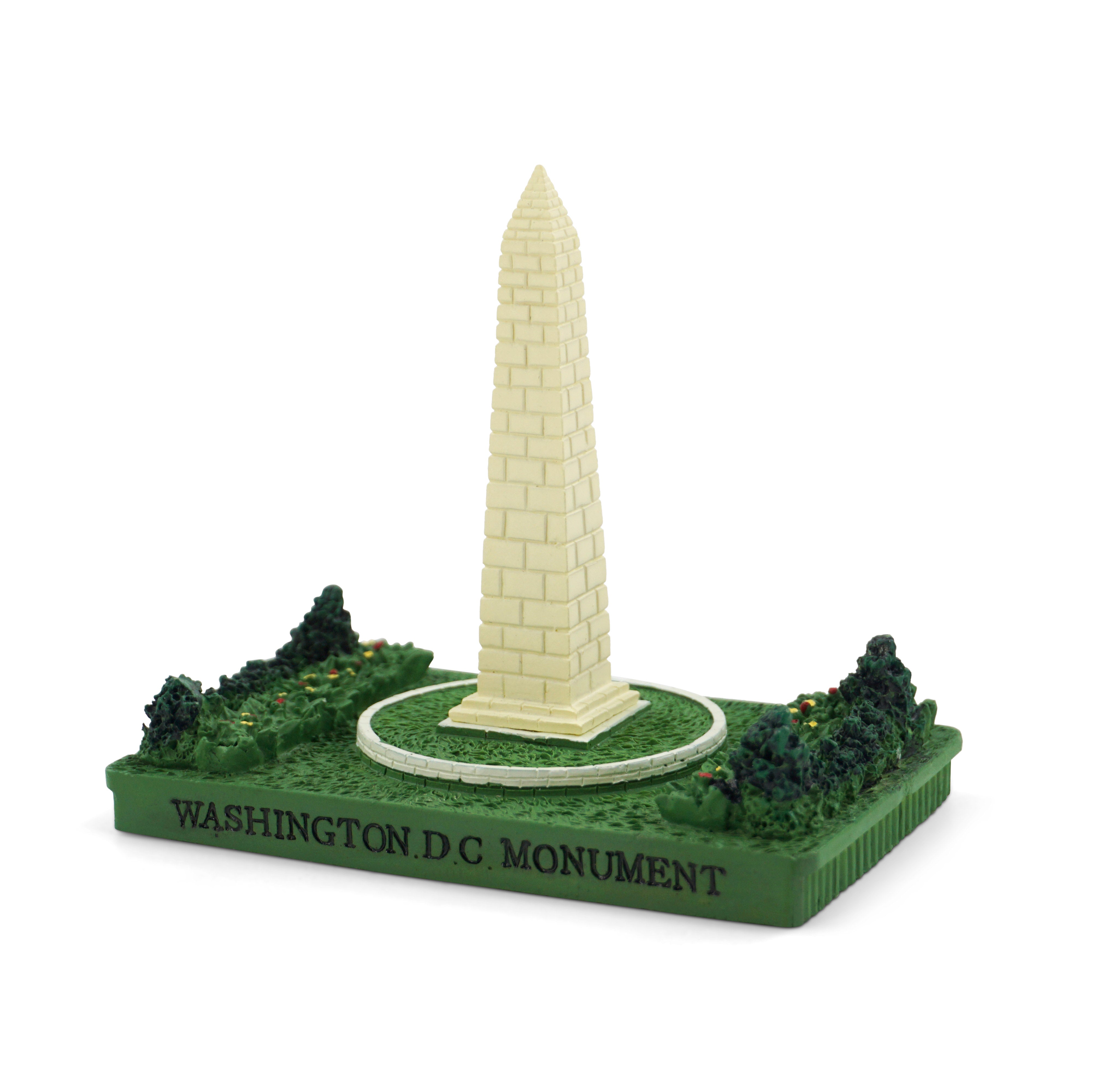 Model of the Washington Monument on a green base with 'Washington D.C. Monument' text.