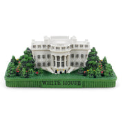 Model of the White House with green base and trees on a white background