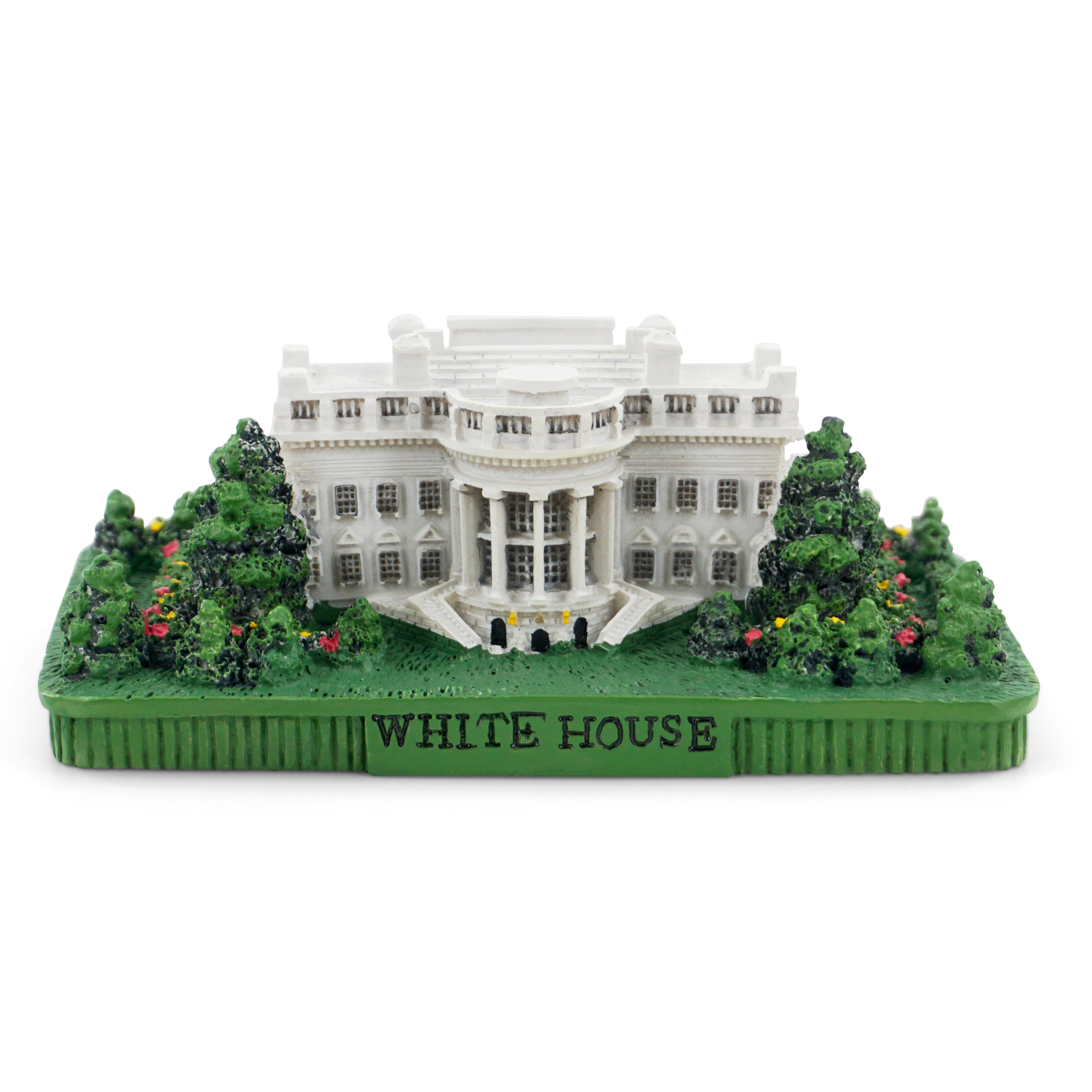 Model of the White House with green base and trees on a white background