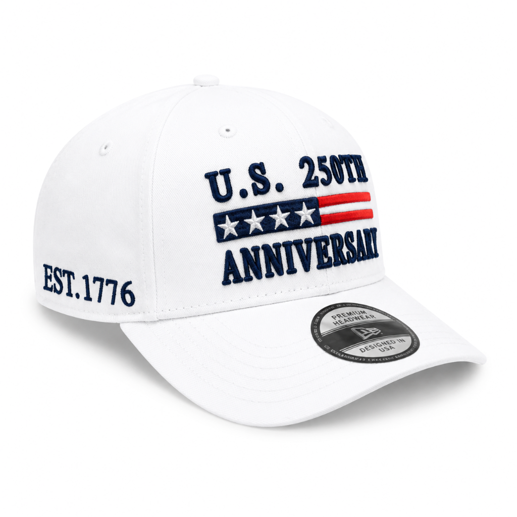 White cap with U.S. 250th Anniversary text and flag design and with EST. 1776 embroidery. on a white background