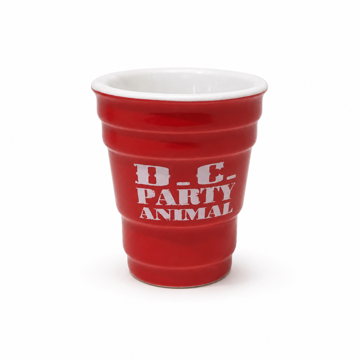 A red plastic party cup with a white interior and white printed text reading 'D.C. PARTY ANIMAL